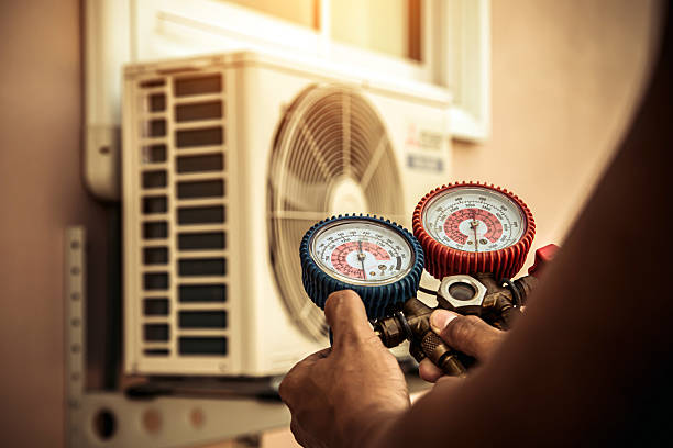 Professional Ductwork Repair technician working in Spring Glen, NY